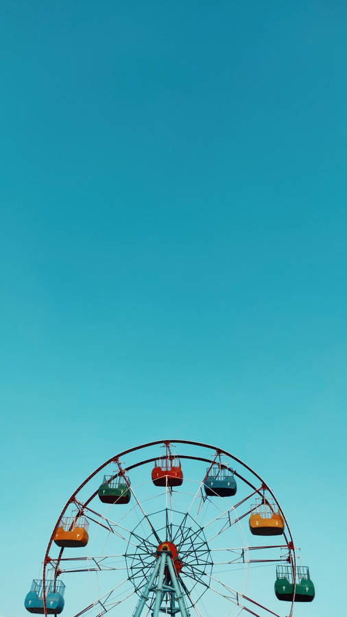Ferris Wheel On Baby Blue Sky Wallpaper