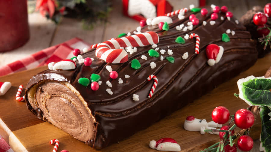 Festive Yule Log Cake Wallpaper