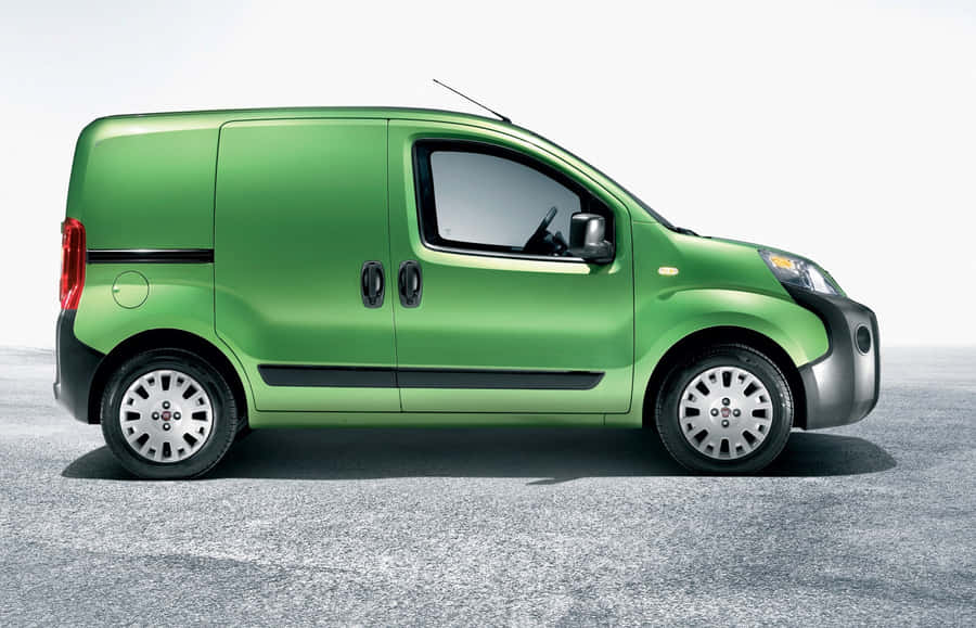 Fiat Fiorino In Cityscape Wallpaper