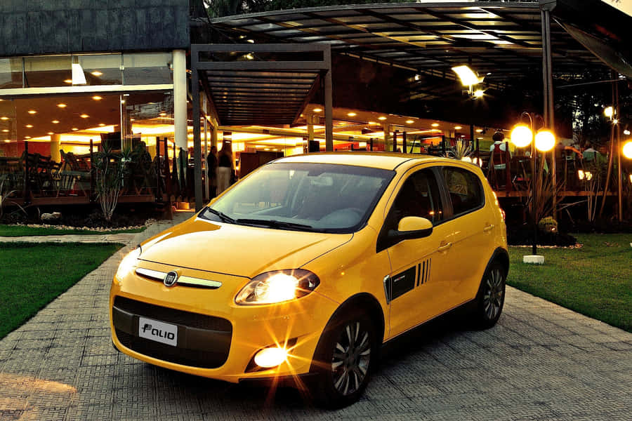 Fiat Palio Wallpaper: Elegant Hatchback On The Road Wallpaper