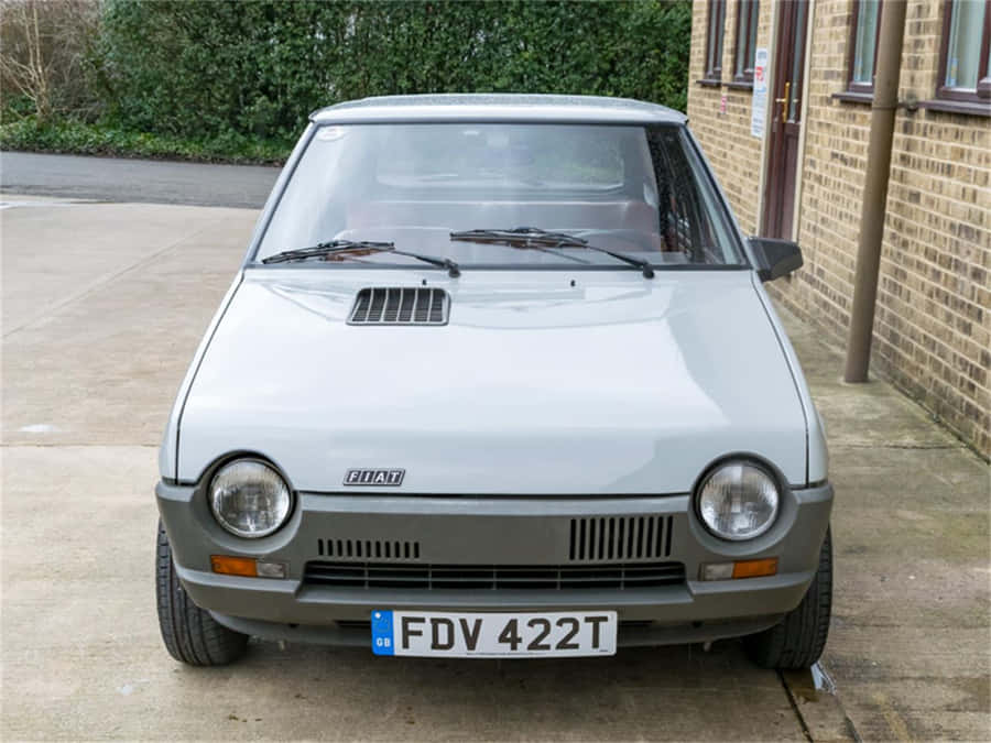 Fiat Ritmo Cruising On The Open Road Wallpaper