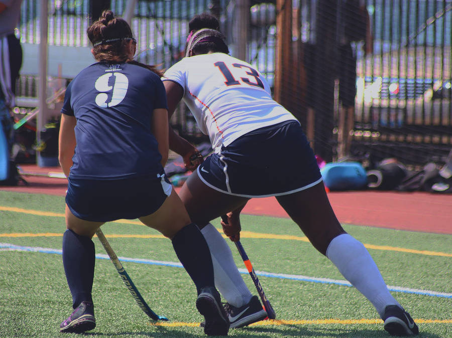 Field Hockey Girls Rear View Wallpaper