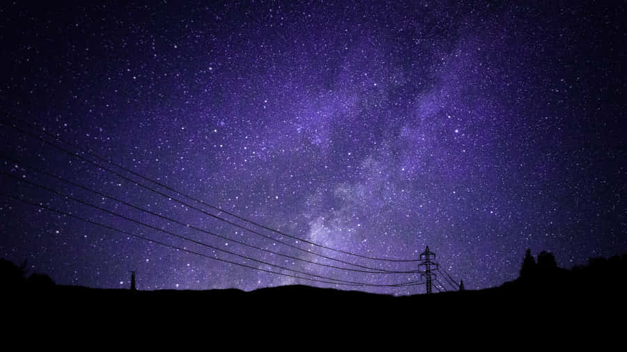 Fleet Of Stars Dancing In The Night Sky Wallpaper