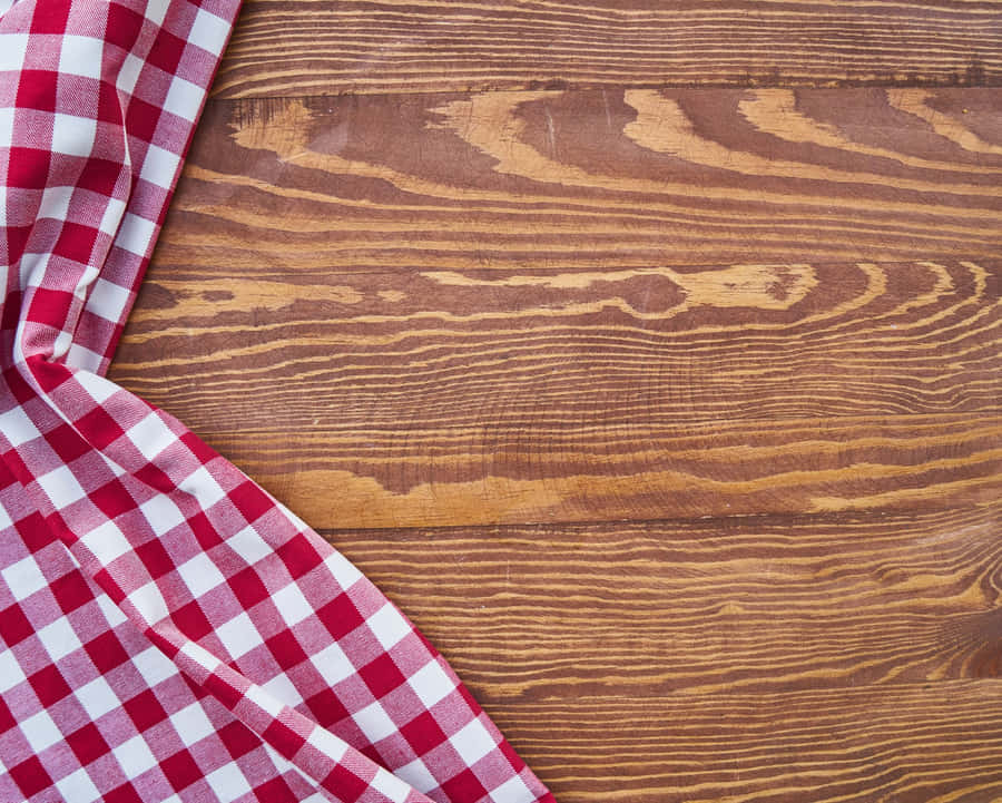 Flourishing Pink And Yellow Flowers In A Garden Wallpaper