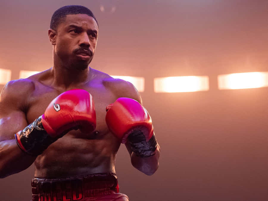 Focused Boxer Readyto Fight Wallpaper