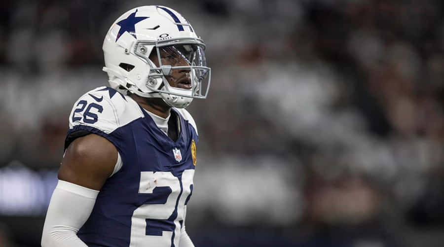 Focused Football Player Number26 Wallpaper