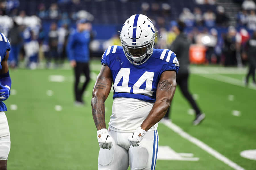 Focused Football Player Number44 Wallpaper