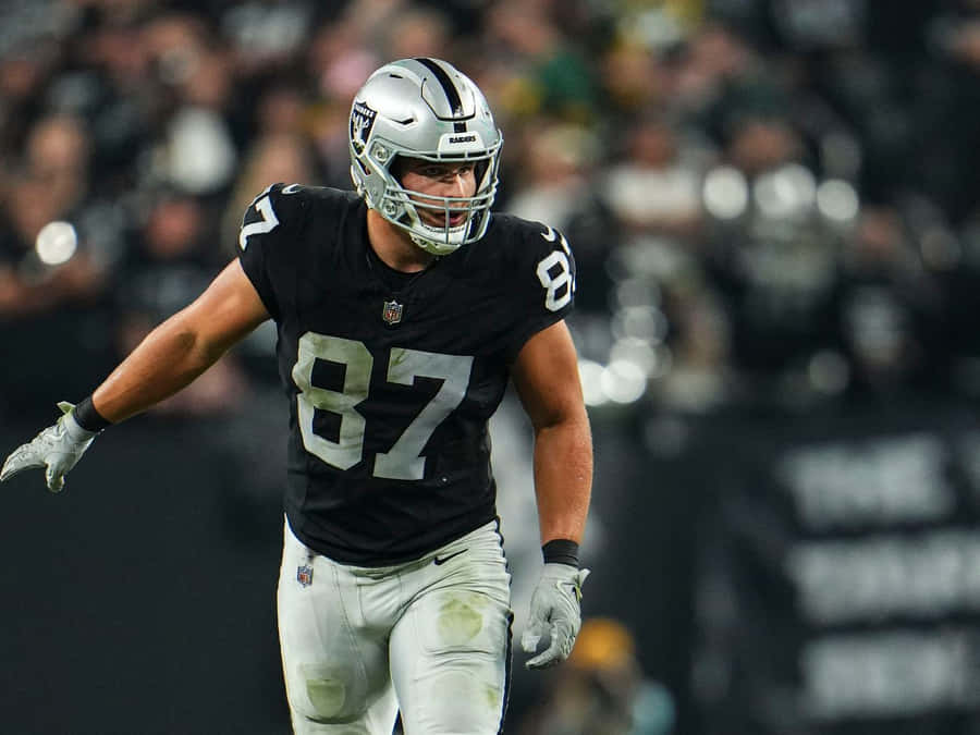 Focused Football Player Number87 Wallpaper