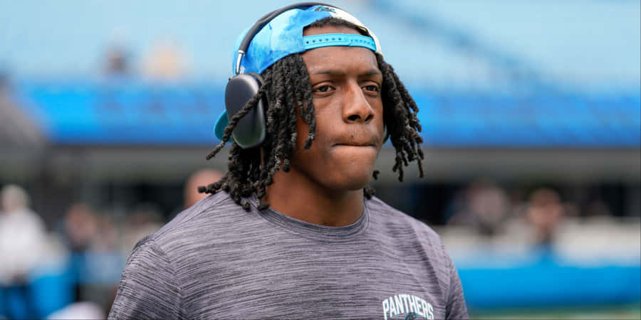 Focused Football Player Pre Game Warmup Wallpaper