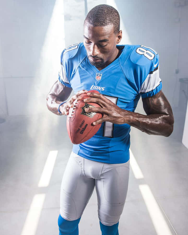 Focused Football Player Preparation Wallpaper