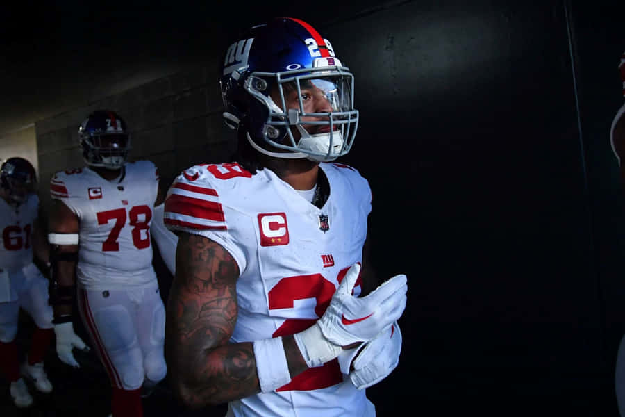 Focused Football Player Tunnel Entrance Wallpaper