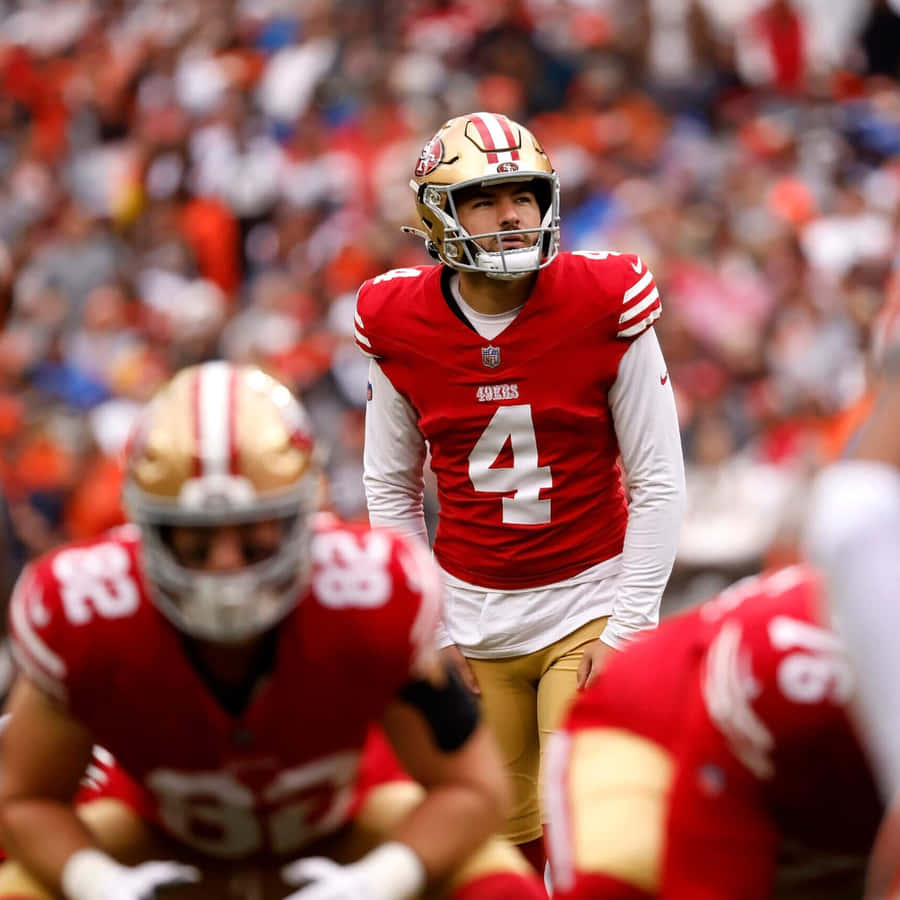 Focused Quarterback Preparation Wallpaper