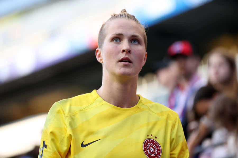 Focused Soccer Goalkeeper Bella Bixby Wallpaper