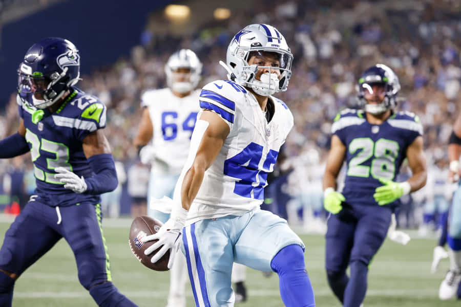 Football Action Dallasvs Seattle Wallpaper
