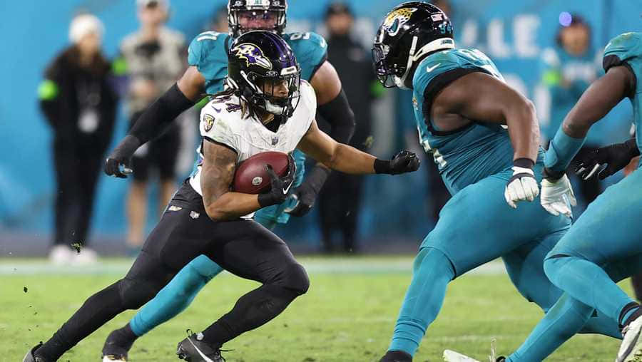 Football Action Jaguarsvs Ravens Wallpaper