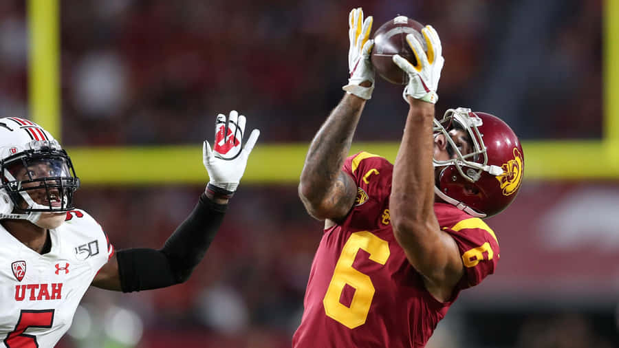 Football Catchin Action Michael Pittman Jr Wallpaper