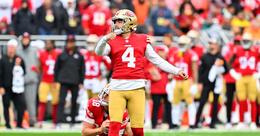 Football Kicker Preparing Field Goal Wallpaper