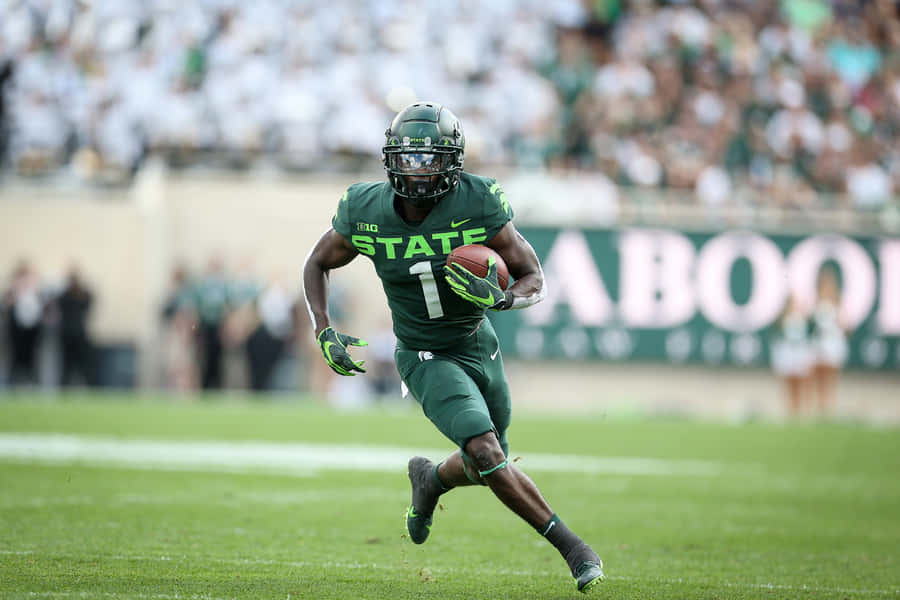 Football Player Action Shot Wallpaper