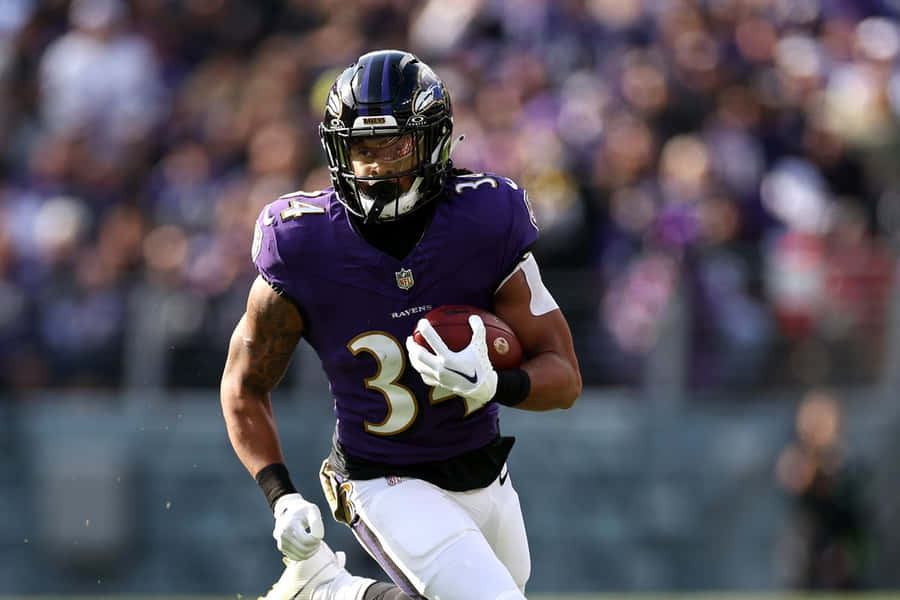 Football Player Action Shot Wallpaper