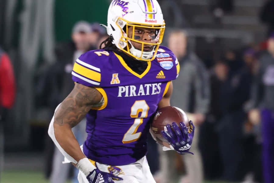 Football Player Action Shot Wallpaper