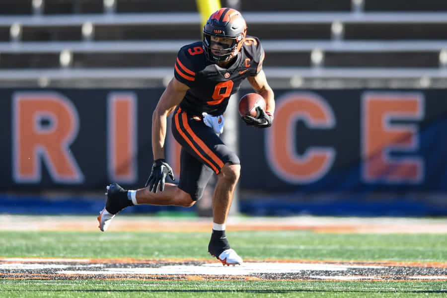 Football Player Action Shot Wallpaper