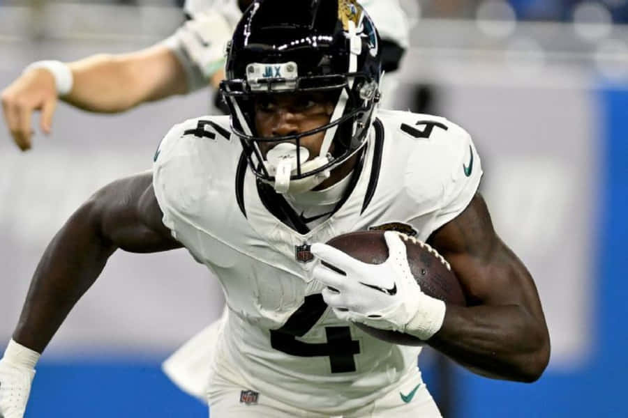 Football Player Action Shot Wallpaper