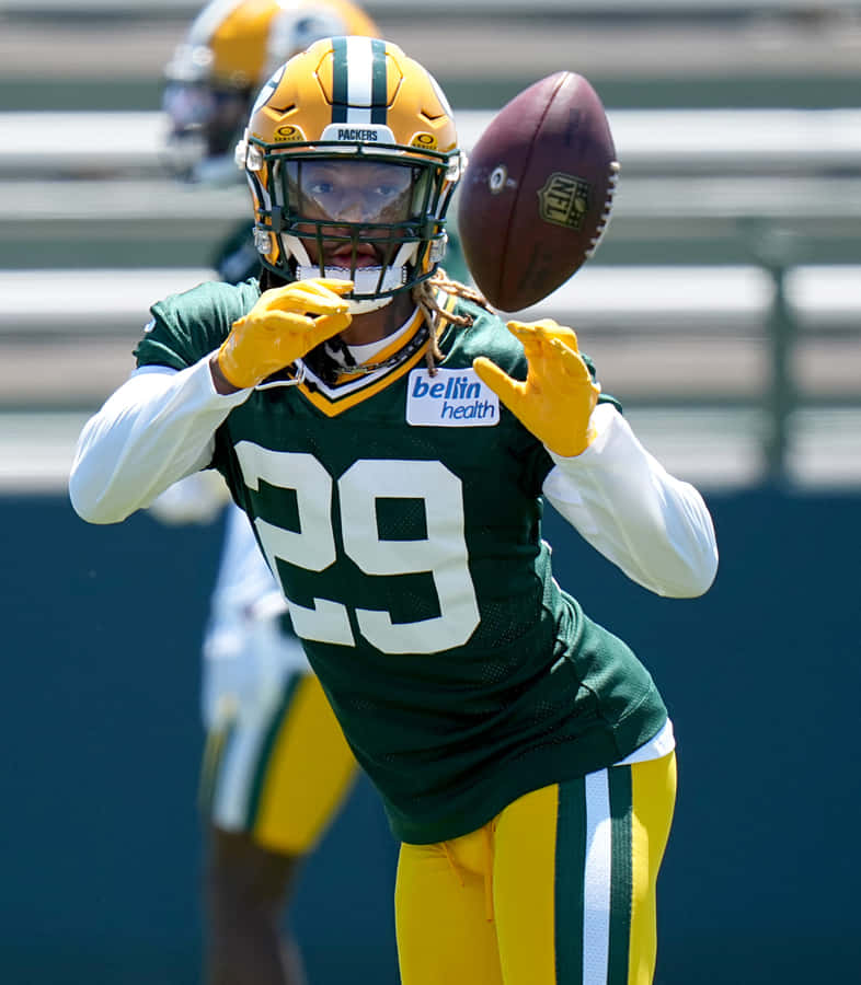 Football Player Catching Practice Wallpaper