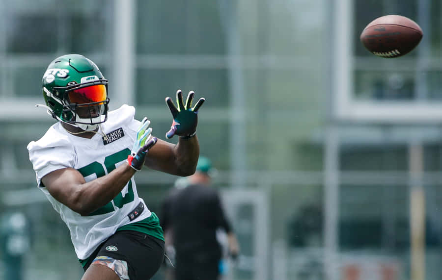 Football Player Catching Practice Breece Hall Wallpaper