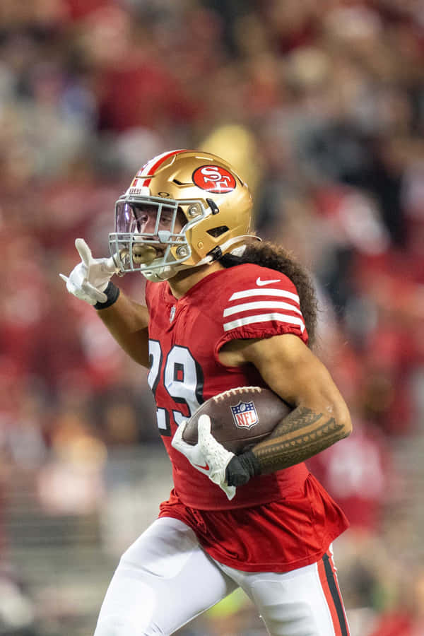 Football_ Player_ Celebrating_on_ Field_29 Wallpaper