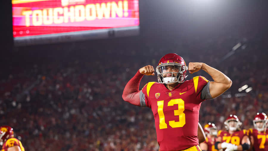 Football Player Celebrating Touchdown Wallpaper