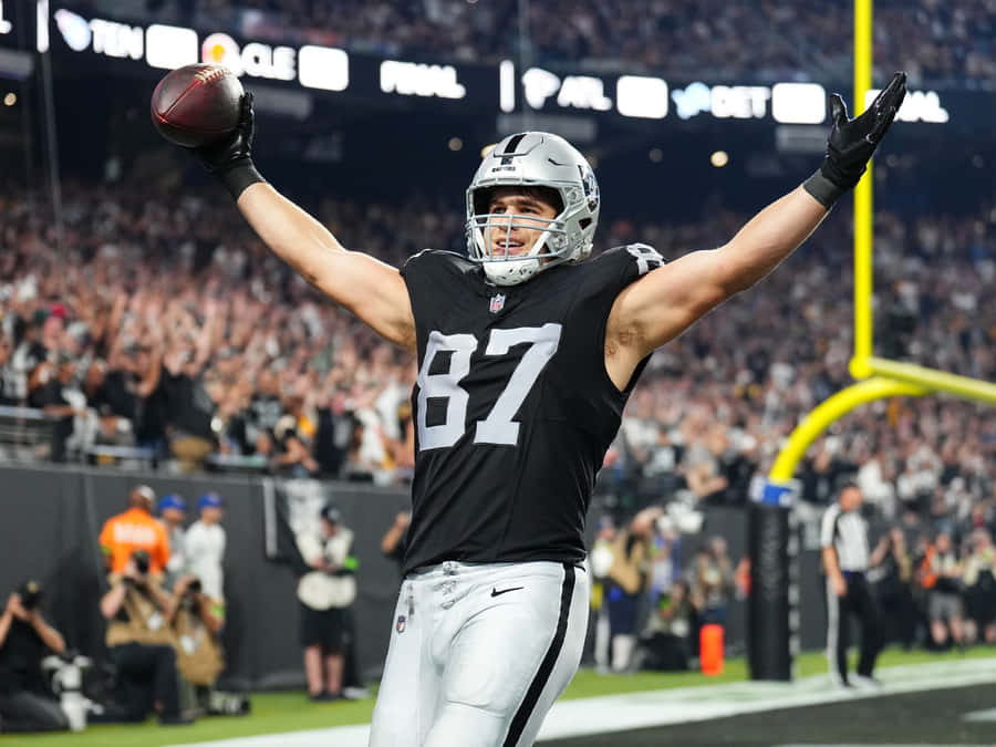 Football Player Celebrating Touchdown Wallpaper