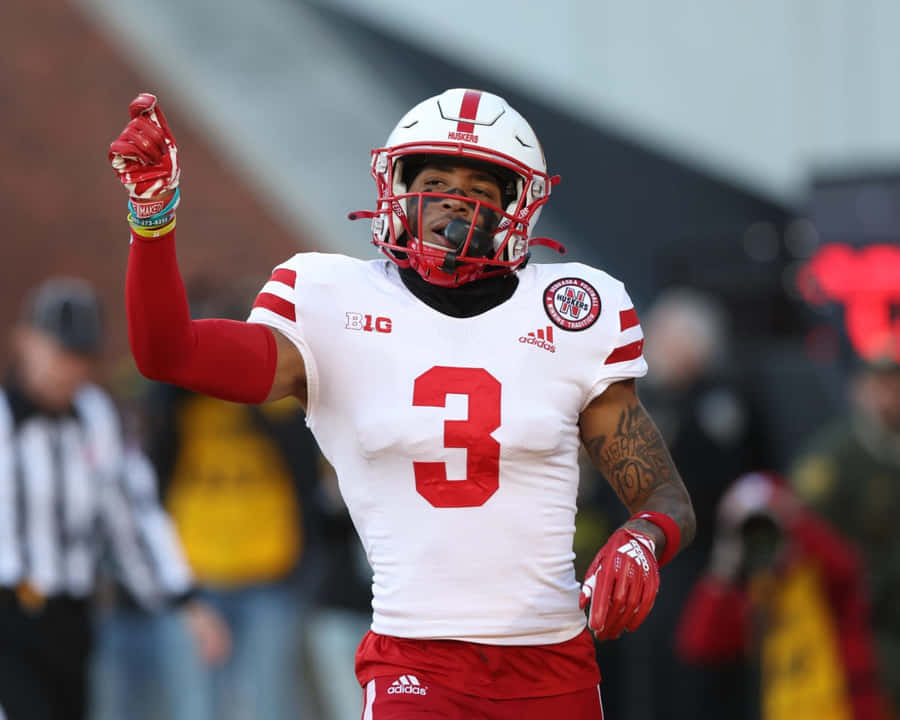 Football Player Celebrating Victory Wallpaper