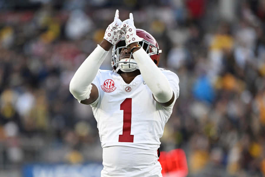 Football Player Celebrating Victory Wallpaper