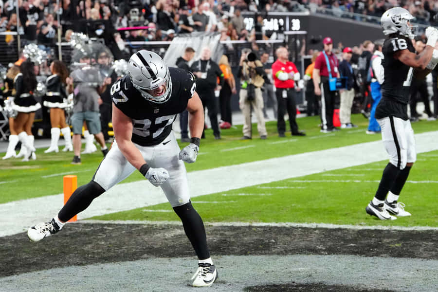 Football Player Celebrationat Stadium Wallpaper