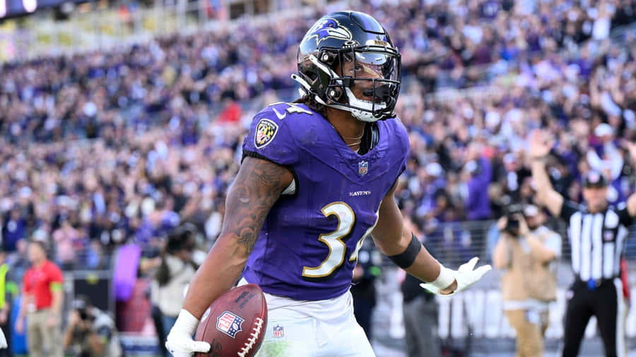 Football Player Celebrationat Stadium Wallpaper