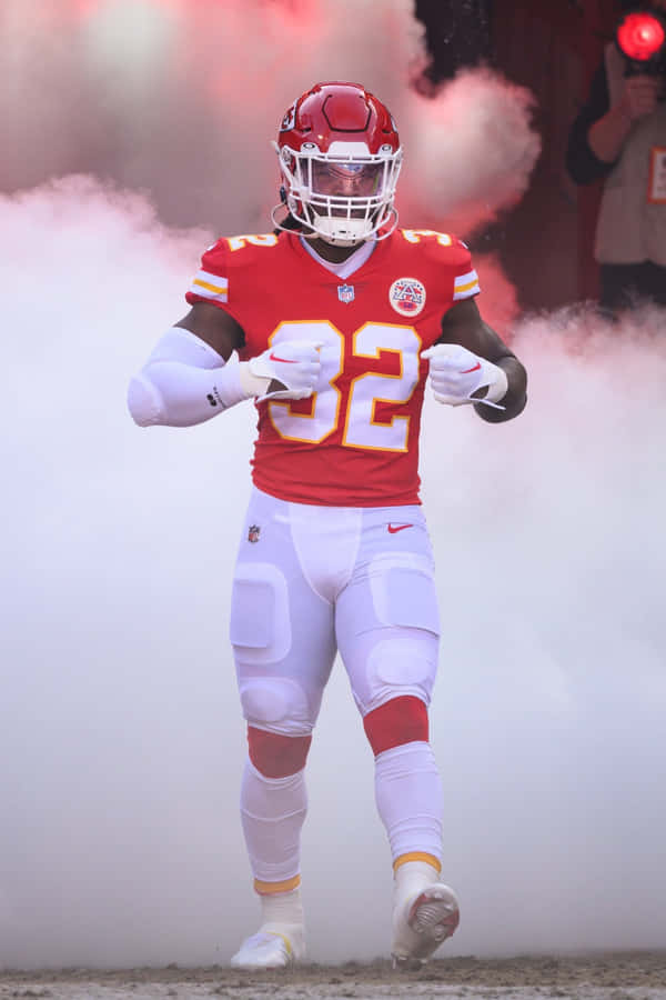 Football_ Player_ Emerging_from_ Smoke Wallpaper