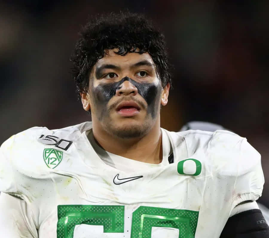 Football Player Eye Blackand Jersey Wallpaper