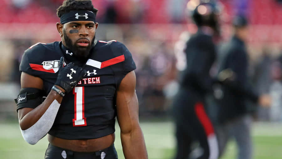 Football Player Number One On Field Wallpaper