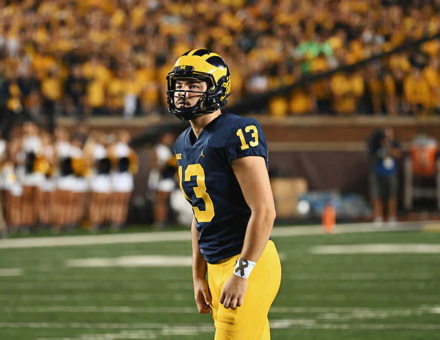 Football Player Number13 On Field Wallpaper