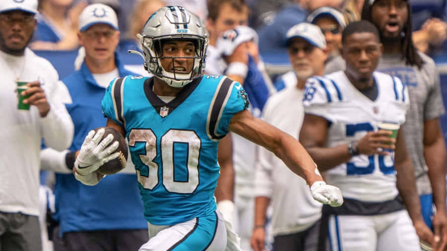 Football Player Number30 In Action Wallpaper