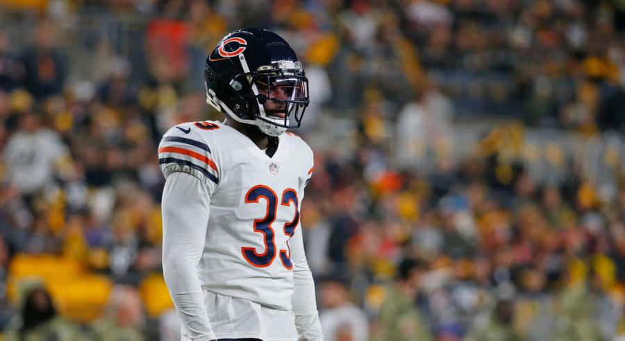 Football Player Number33 On Field Wallpaper