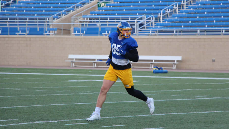 Football Player Practice Drill Wallpaper