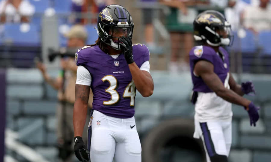 Football Player Pre Game Concentration Wallpaper