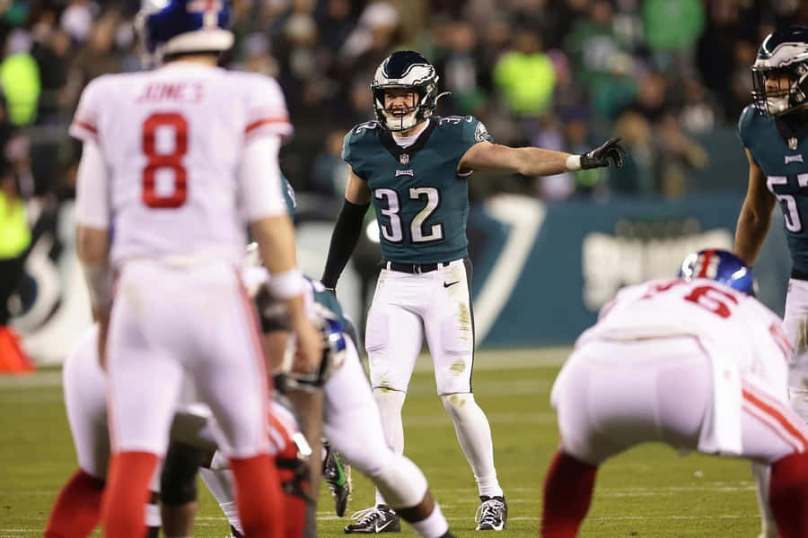 Football Player Ready For Action Wallpaper