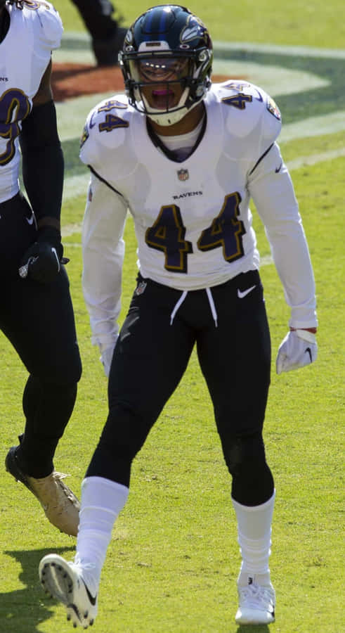 Football Player Ready For Action Wallpaper