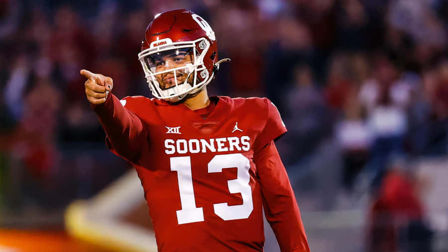 Football Quarterback Pointing Action Wallpaper