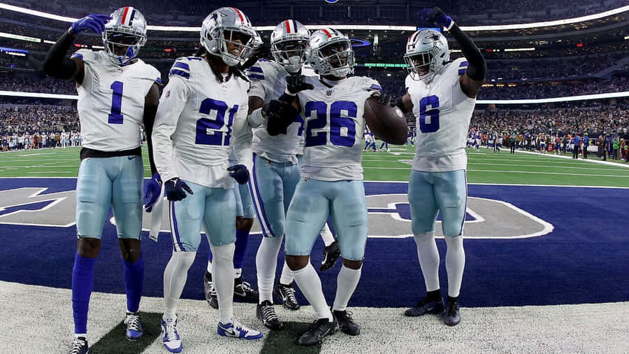 Football Team Celebrationat Stadium Wallpaper