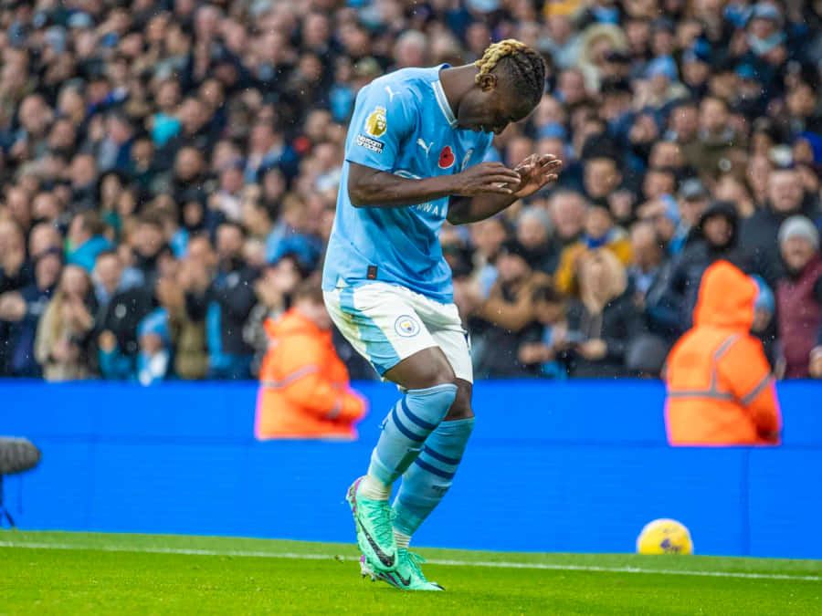 Footballer Performing Griddy Celebration Wallpaper