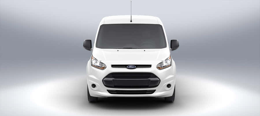 Ford Transit Van Cruising On A Scenic Highway Wallpaper