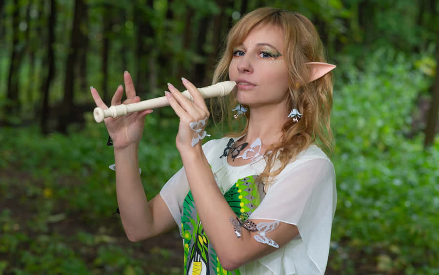 Forest Elf Flute Performance.jpg Wallpaper